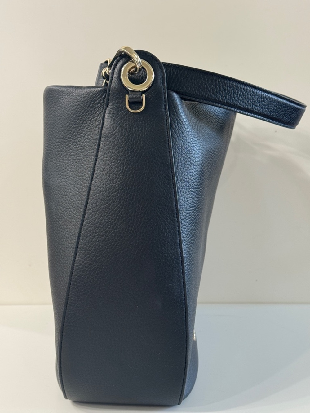 LIKE NEW. Kate Spade - Black Leather Shoulder Bag with Gold Logo - Picture 4 of 5